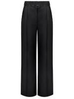 Женские брюки на резинке с выточками из экокожи черные