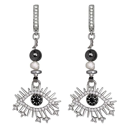 Серебристые серьги с подвесками - оберегами в форме глаз из кристаллов Swarovski ANNA SKOROKHODOVA ACCESSORIZE / АННА СКОРОХОДОВА. АКСЕССУАРЫ